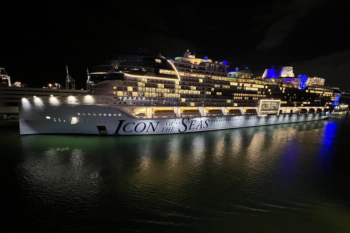Icon of the Seas lit up at night